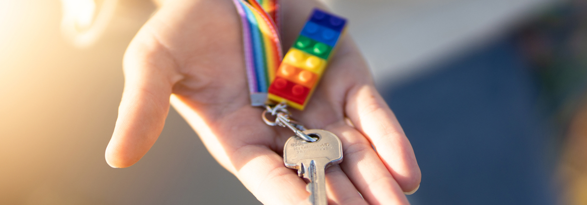 Lgbt flag keychain with the key for hotel guesthouse, hostel doo